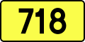 English: Sign of DW 718 with oficial font Drogowskaz and adequate dimensions.