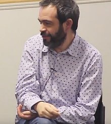 Alexis Petridis speaking in 2015