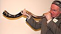 A man sounding a shofar