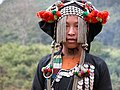 Image 30Akha girl in traditional dress (from Culture of Laos)