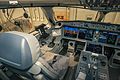 empty cockpit, hangar outside, captain seat