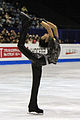 A man performing the Biellmann spin (Yuzuru Hanyu)