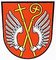 Gemeinde Reundorf In Rot zwei einander zugewandte silberne Flüge mit je einem daraus zur Mitte hervorwachsenden bekleideten silbernen Arm; in der Hand des vorderen Arms ein schräg links gestellter goldener Abtstab, in der Hand des hinteren Arms ein schräg gestellter Kreuzstab; die beiden Stäbe sind gekreuzt.