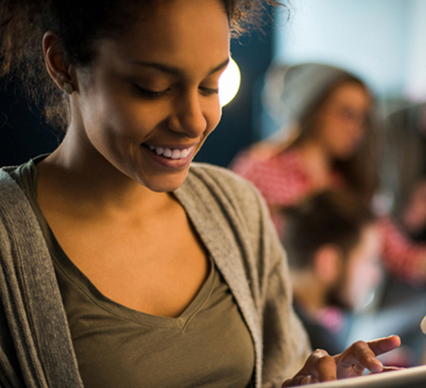 A woman completing a VAERS report online