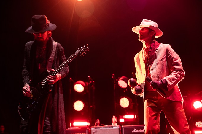 RALEIGH, NORTH CAROLINA - SEPTEMBER 03: Guitarist Dave Navarro (L) and singer Perry Farrell of Jane's Addiction perform at Red Hat Amphitheater on September 03, 2024 in Raleigh, North Carolina. (Photo by Jeff Hahne/Getty Images)