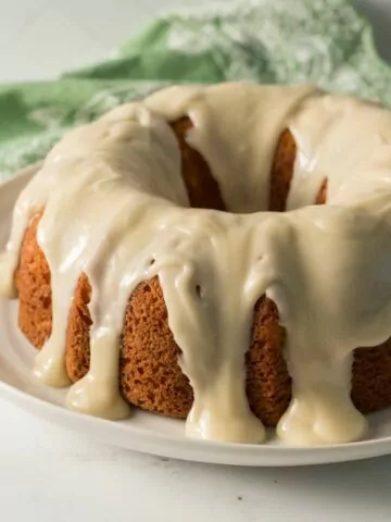 Peach Bundt Cake on white plate.