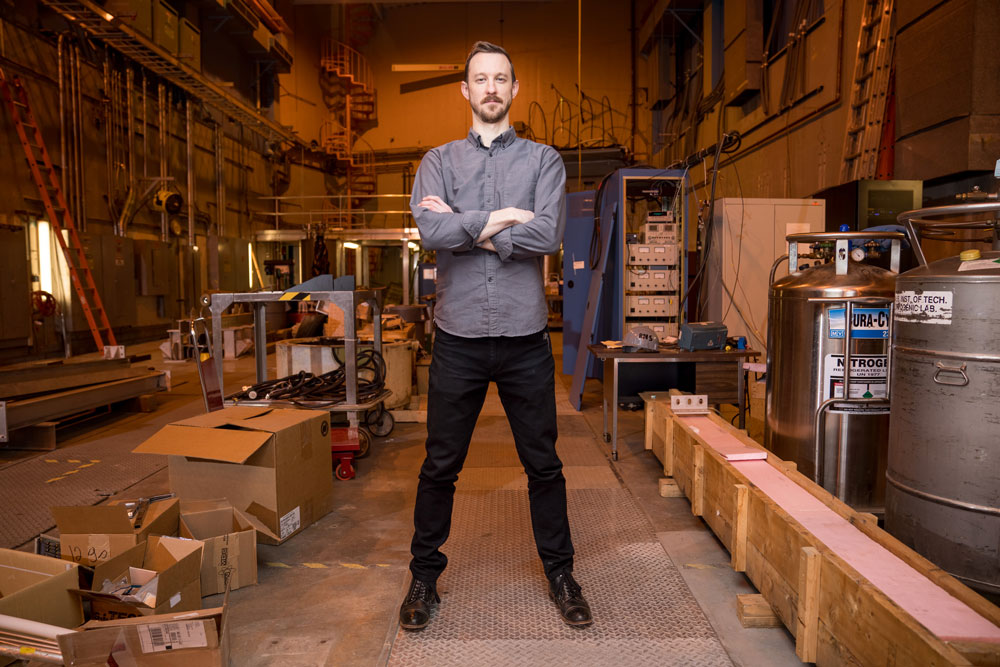 Hartwig stands in warehouse-style lab