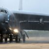 A 2nd Bomb Wing B-52H Stratofortress taxis under a spray of water after returning from a mission July 12, 2014, at Barksdale Air Force Base, La. This marked the last flight for one crew member on the aircraft, Lt. Col. Ronald Polomoscanik, the 343rd Bomb Squadron director of operations, who is retiring after 23 years of service. (U.S. Air Force photo by Master Sgt. Greg Steele/Released)