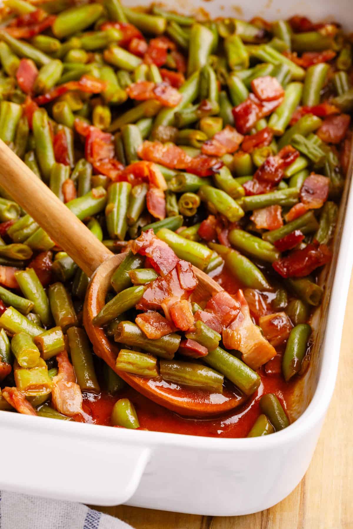 close up image of crack green beans in a 9x13 inch casserole dish. 