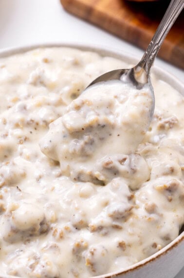 sausage gravy with a spoon.