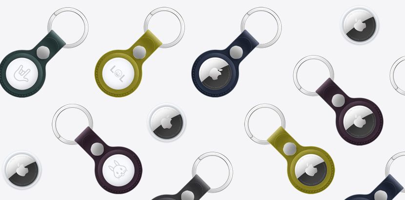 An array of AirTags and AirTags with FineWoven Key Ring in various colors including Chartreuse, Dark Green, Deep Blue, Blackberry, and Black.