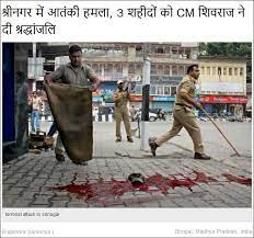 Image sImage shows Indian army soldiers gathering dead bodies of militants in Ringawari, 2007