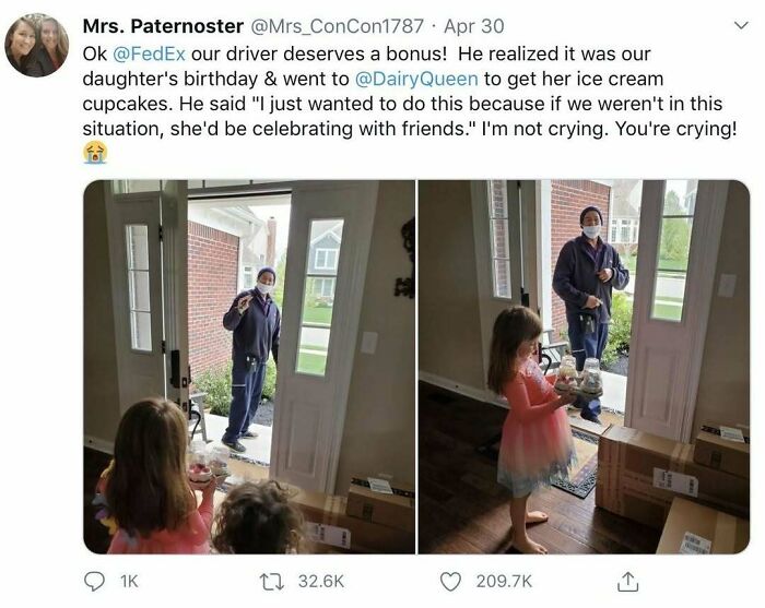 Woman and child at doorway greet FedEx driver with ice cream in hand, capturing kindness in real life.