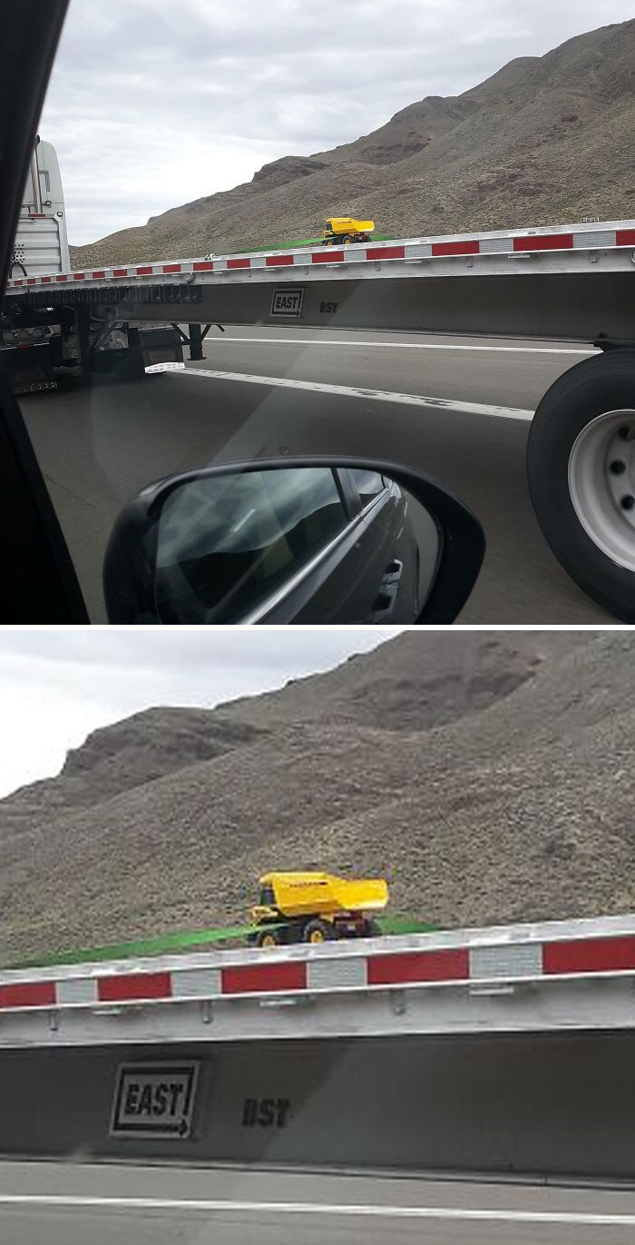 Toy dump truck on a flatbed truck, an interesting thing seen on the road.