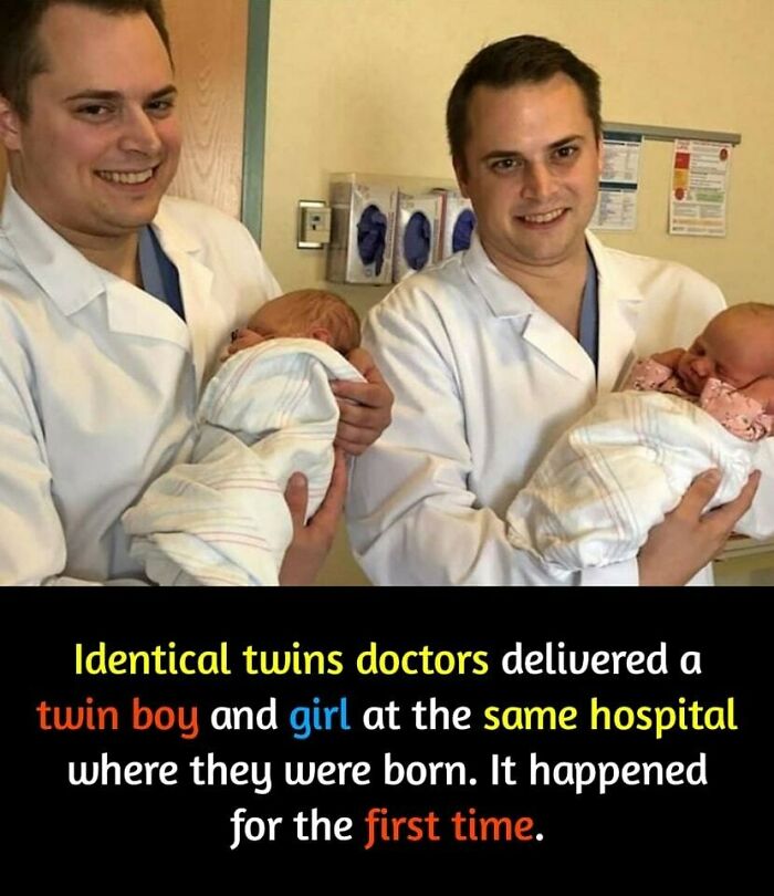 Identical twin doctors holding newborn twins at a hospital, marking a surprising first-time event.