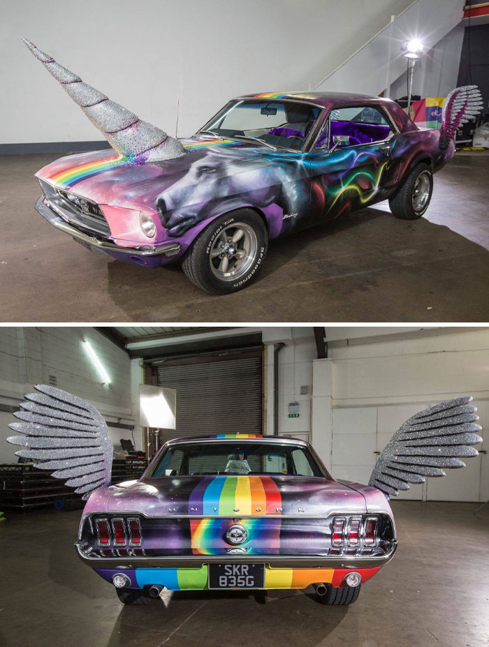 Unicorn-themed car with large horn and wings in a garage, exemplifying car-fails.