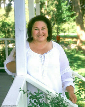 photo of me on porch with white shirt