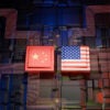 U.S. and Chinese flags amid a digitally generated image representing high technology