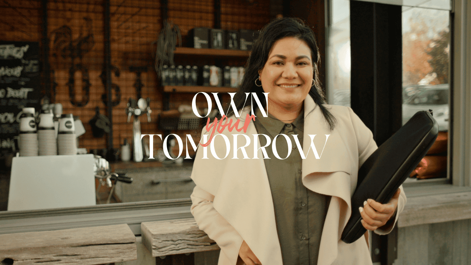 Image of woman with the words "Own your tomorrow"