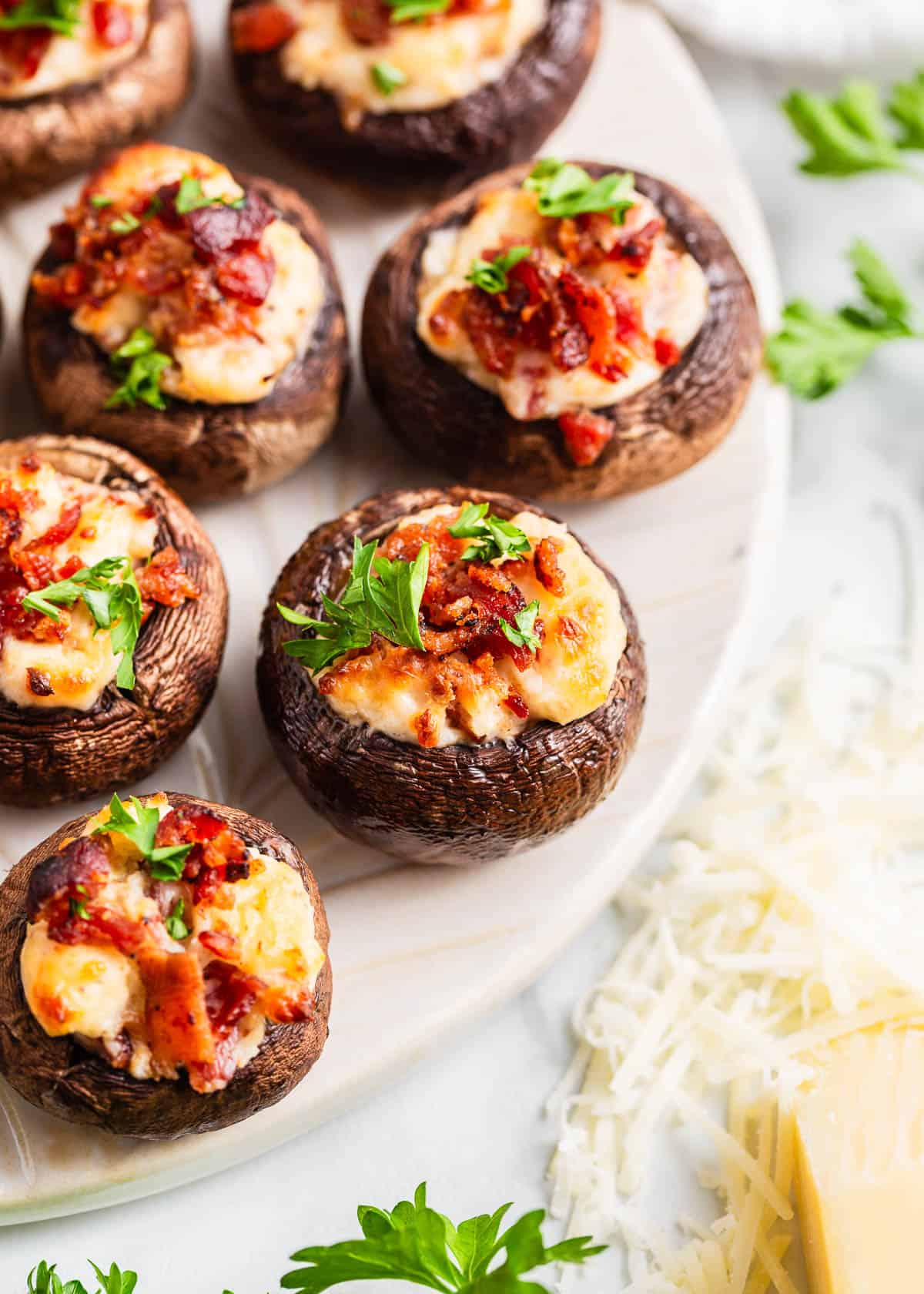 Stuffed mushrooms on a plate.