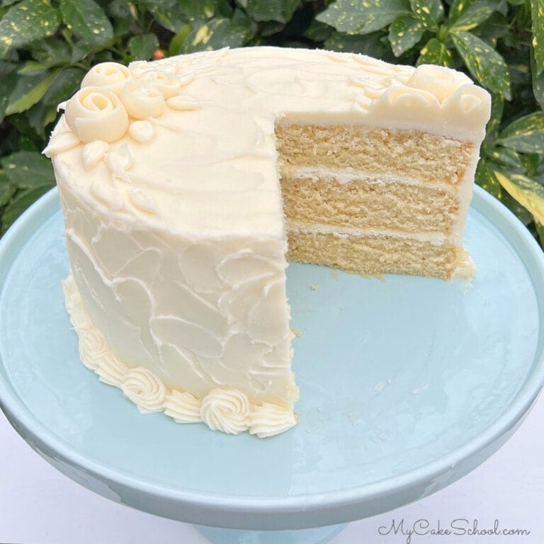 Sliced Gluten Free Vanilla Cake on Pedestal