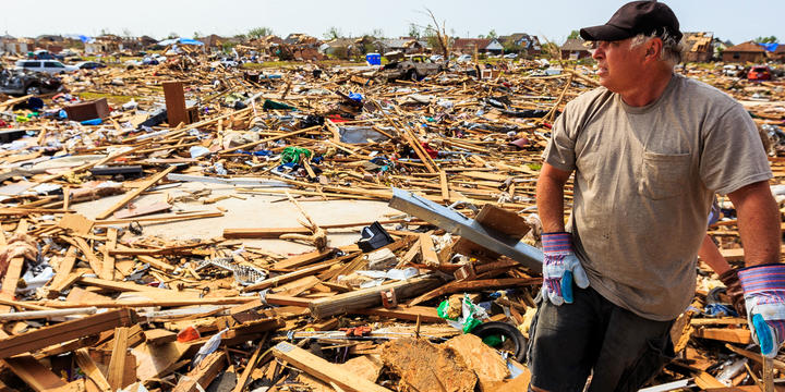 Homeowner looks at the Remain of His Neighborhood