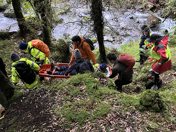 Carrying a stretcher during the Waikato SAR exercise.