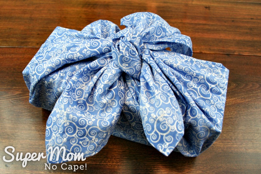 Box wrapped in blue Christmas furoshiki