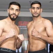 Amir Khan beats Billy Dib in the fourth round in Jeddah, Saudi Arabia