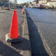 Yellow lines could be painted on the pavement outside of Cherry Tree Primary School