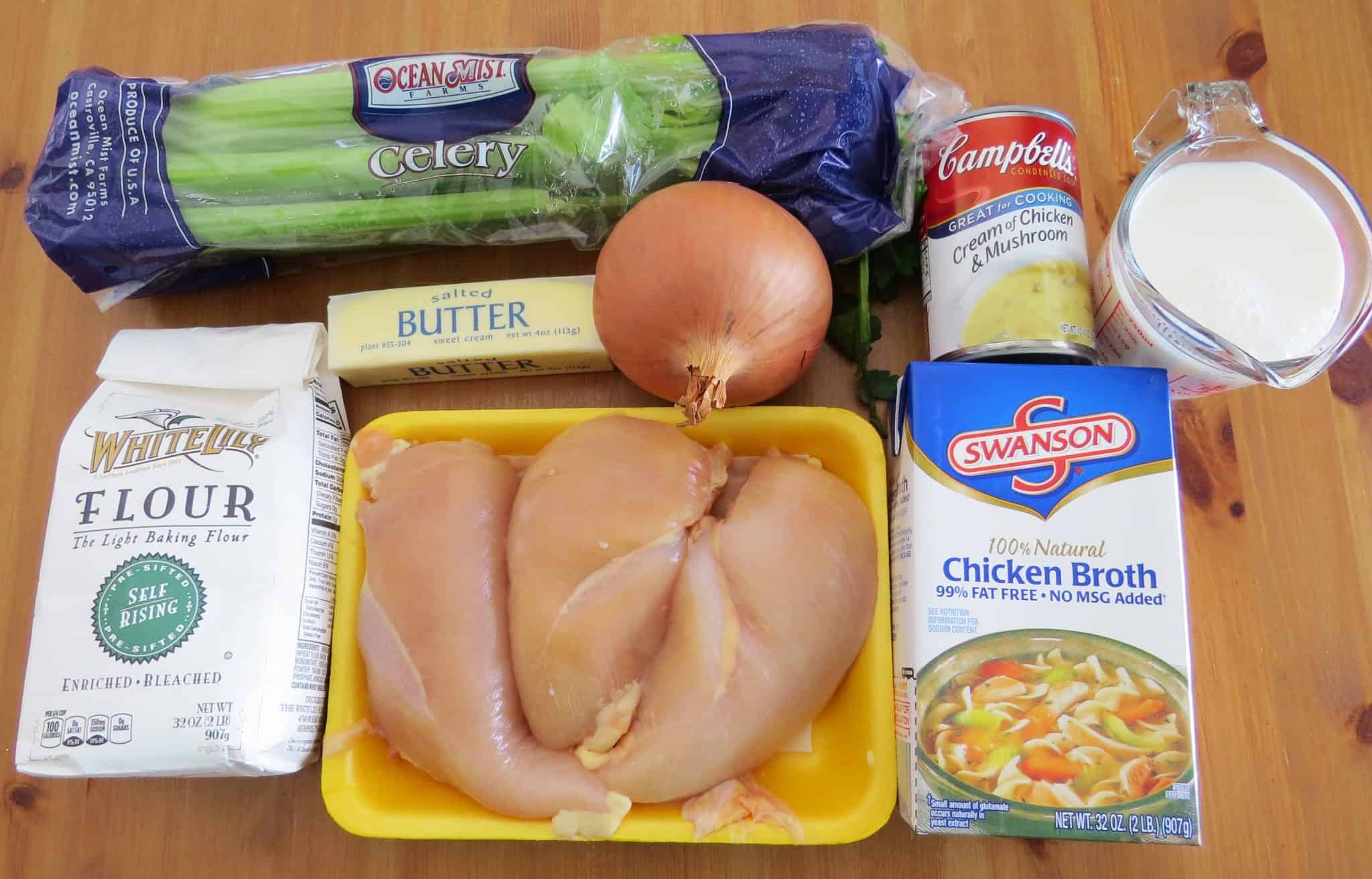 Chicken and Dumplings Casserole ingredients: butter, onion, celery, chicken breasts, self-rising flour, milk, chicken broth, cream of chicken soup, milk.