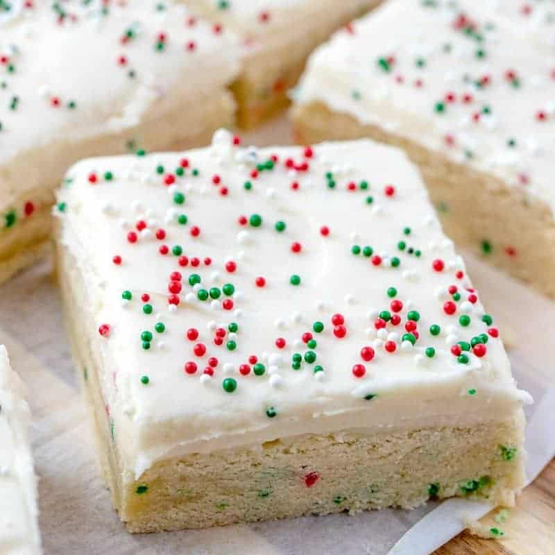 Holiday Sugar Cookie Bars topped with Cream Cheese Frosting