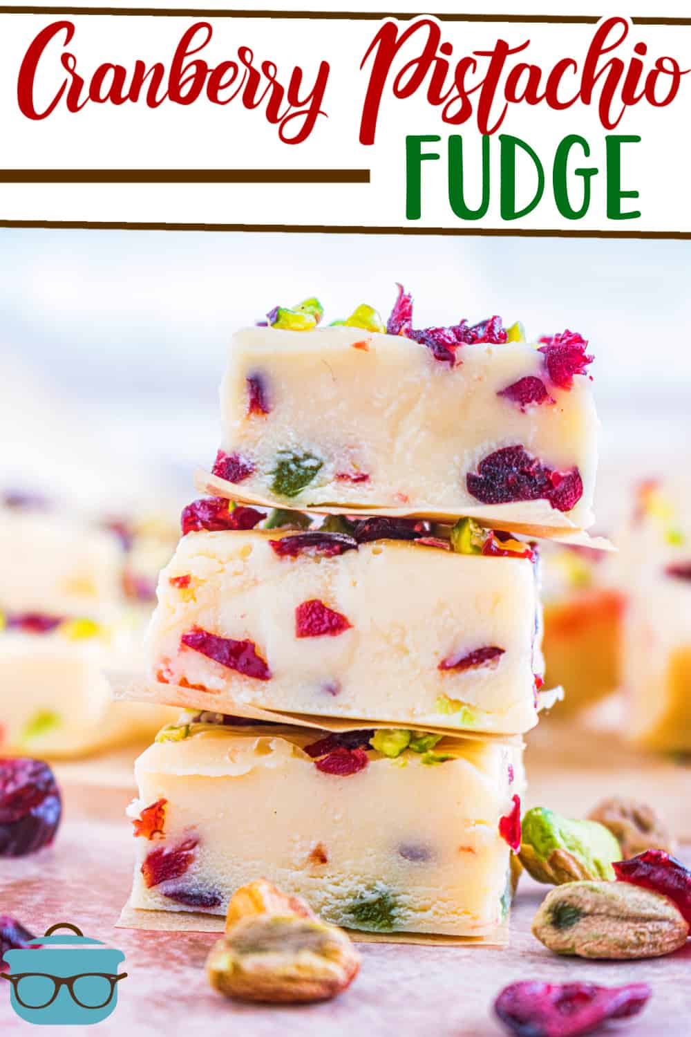 White Chocolate Cranberry Pistachio Fudge recipe from The Country Cook, three slices of fudge shown stacked on top of each other.