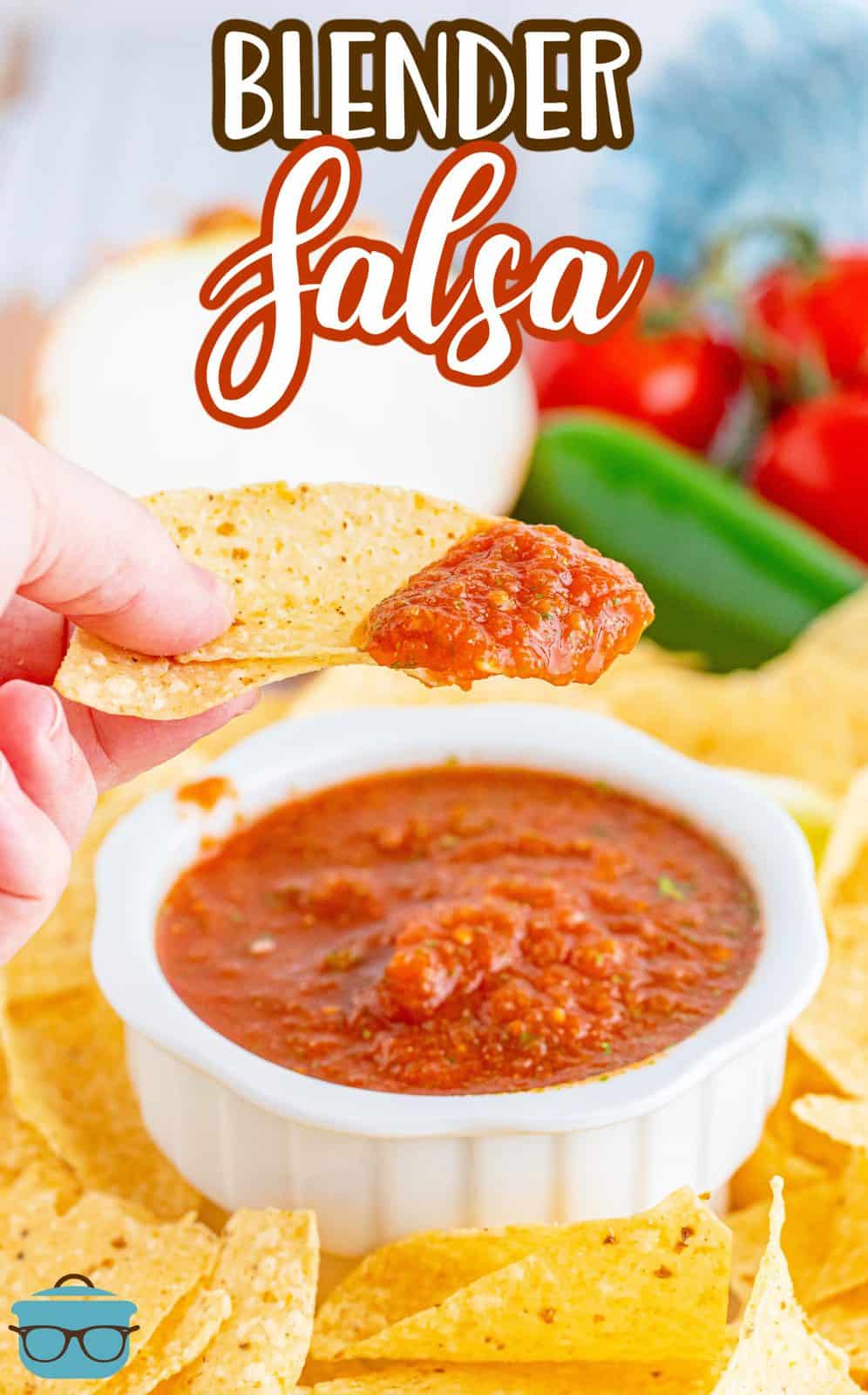 Pinterest image of hand holding up some Blender Salsa on chip.