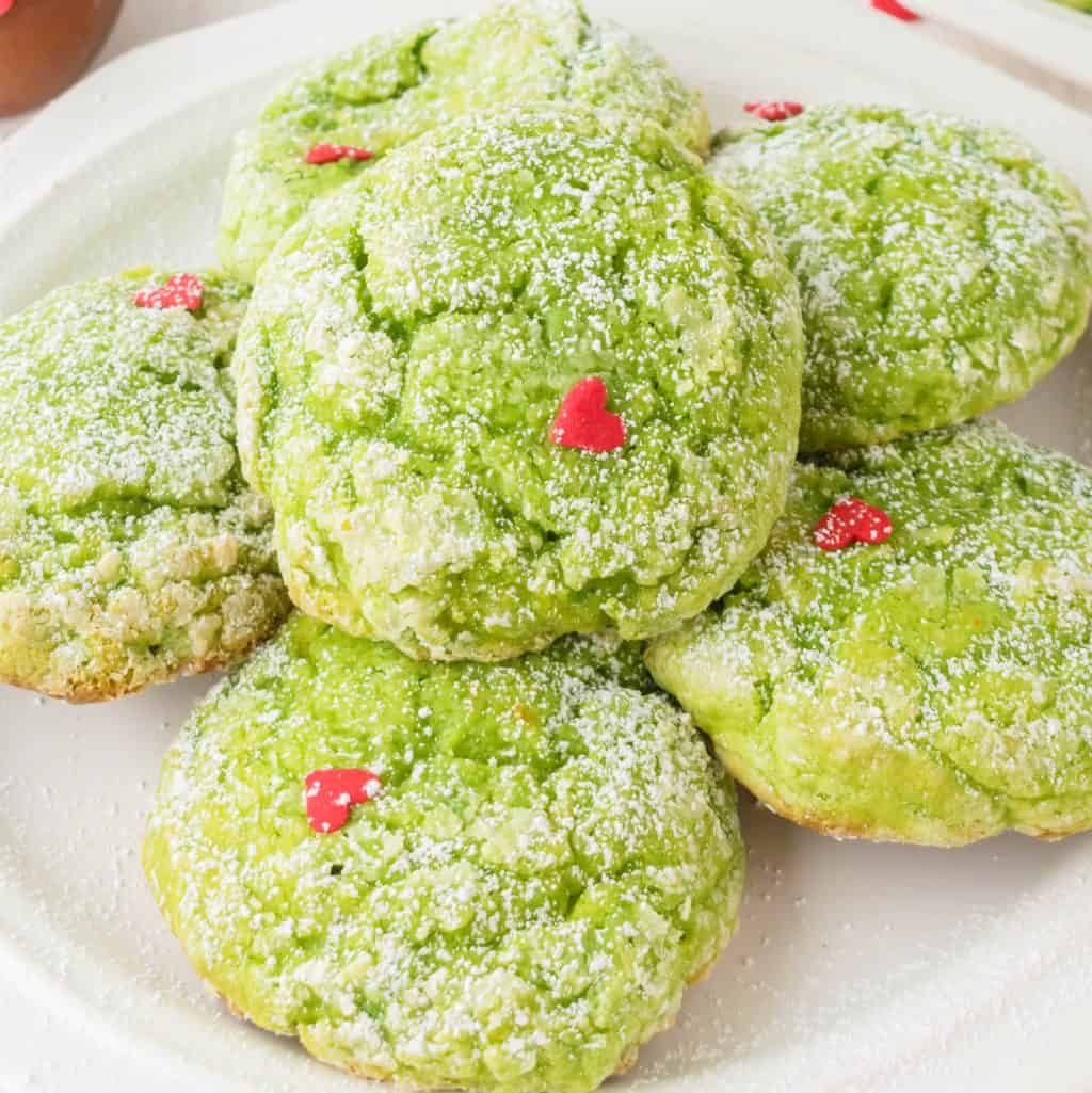 Close up looking at a plate of green Grinch Cookies.