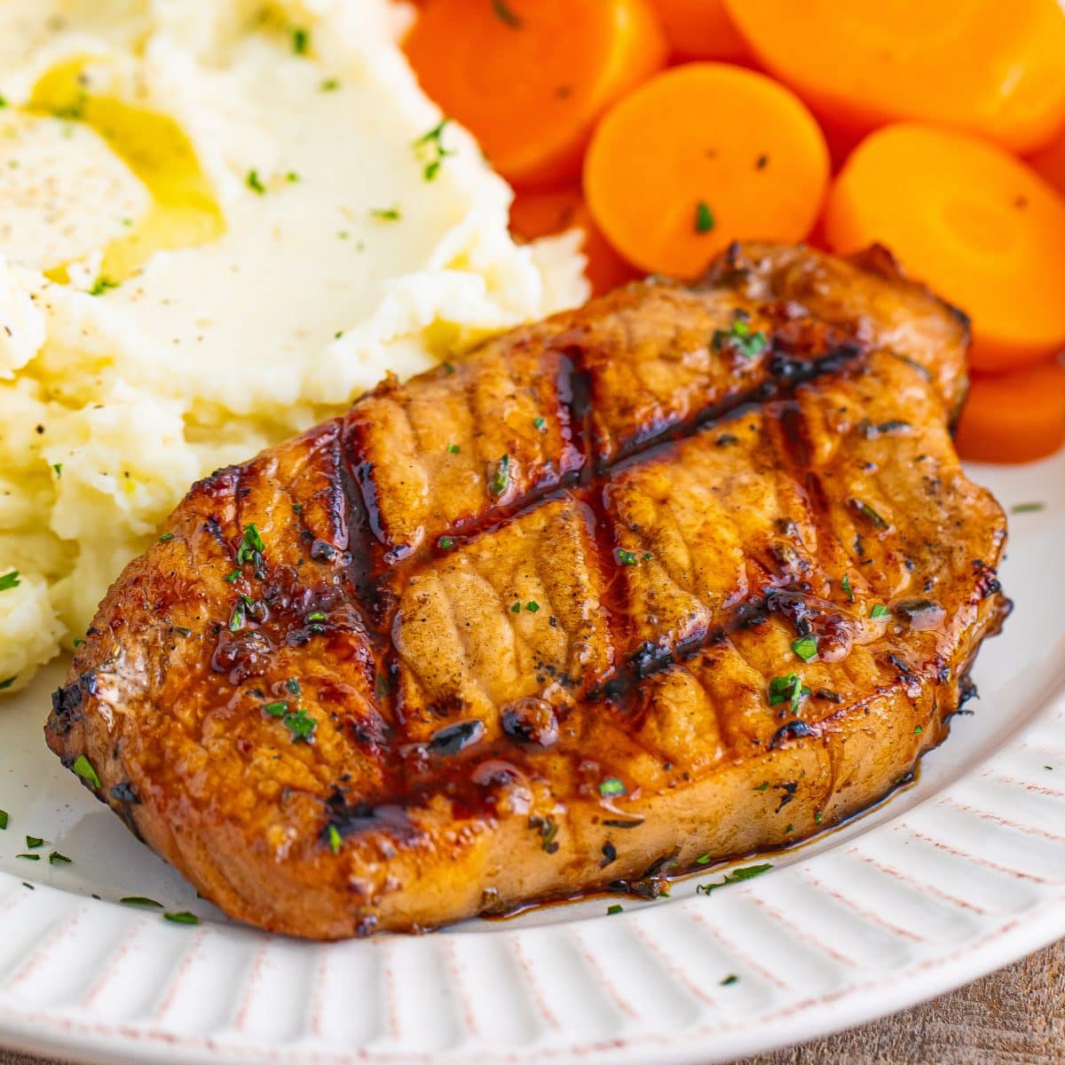 Close up looking at a Grilled Balsamic Pork Chop.