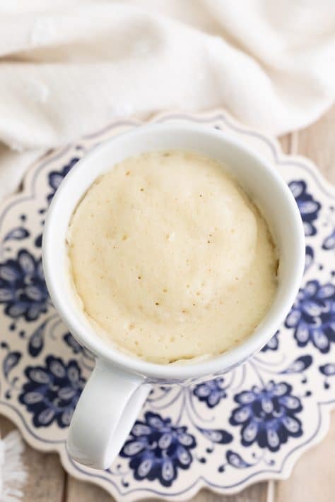 A fresh baked pancake in a mug.