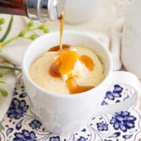 Syrup being poured on a Pancake in a Mug.