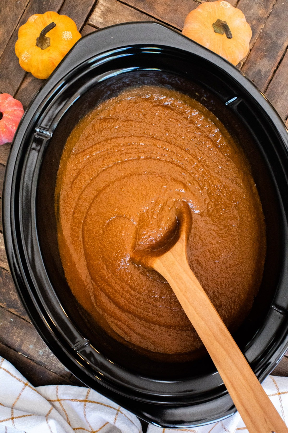 close up of pumpkin butter in slow cooker