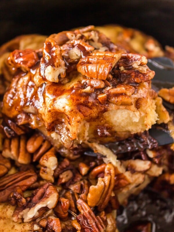 A sticky bun on a spatula.