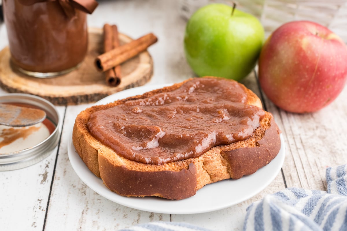 slow cooker caramel apple butter on a piece of toast.