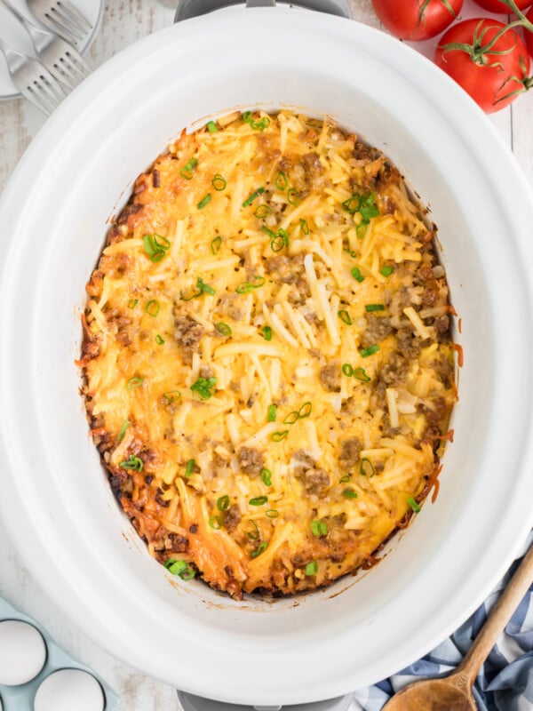 breakfast casserole in a white slow cooker.