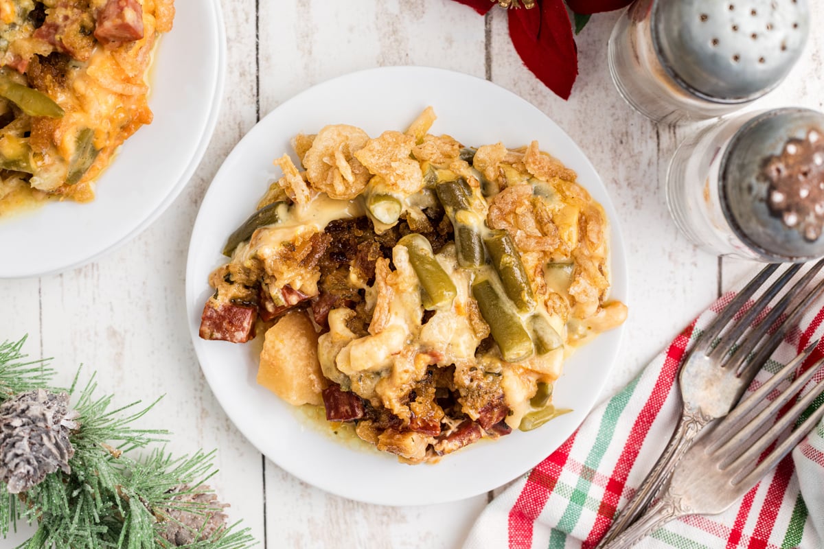 A serving of slow cooker Christmas casserole on a plate.