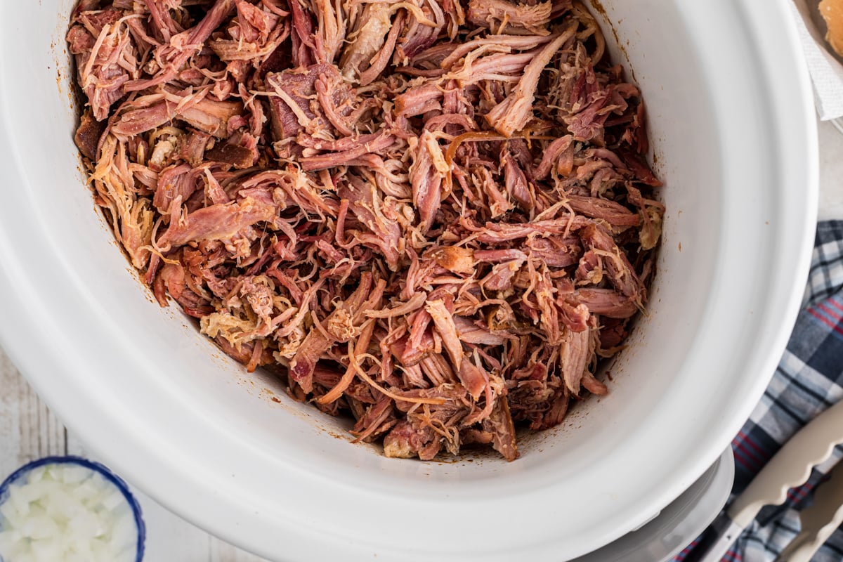 close-up overhead of slow cooker pulled ham.