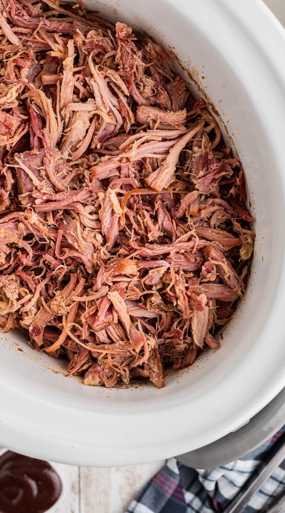 long image of slow cooker pulled ham.