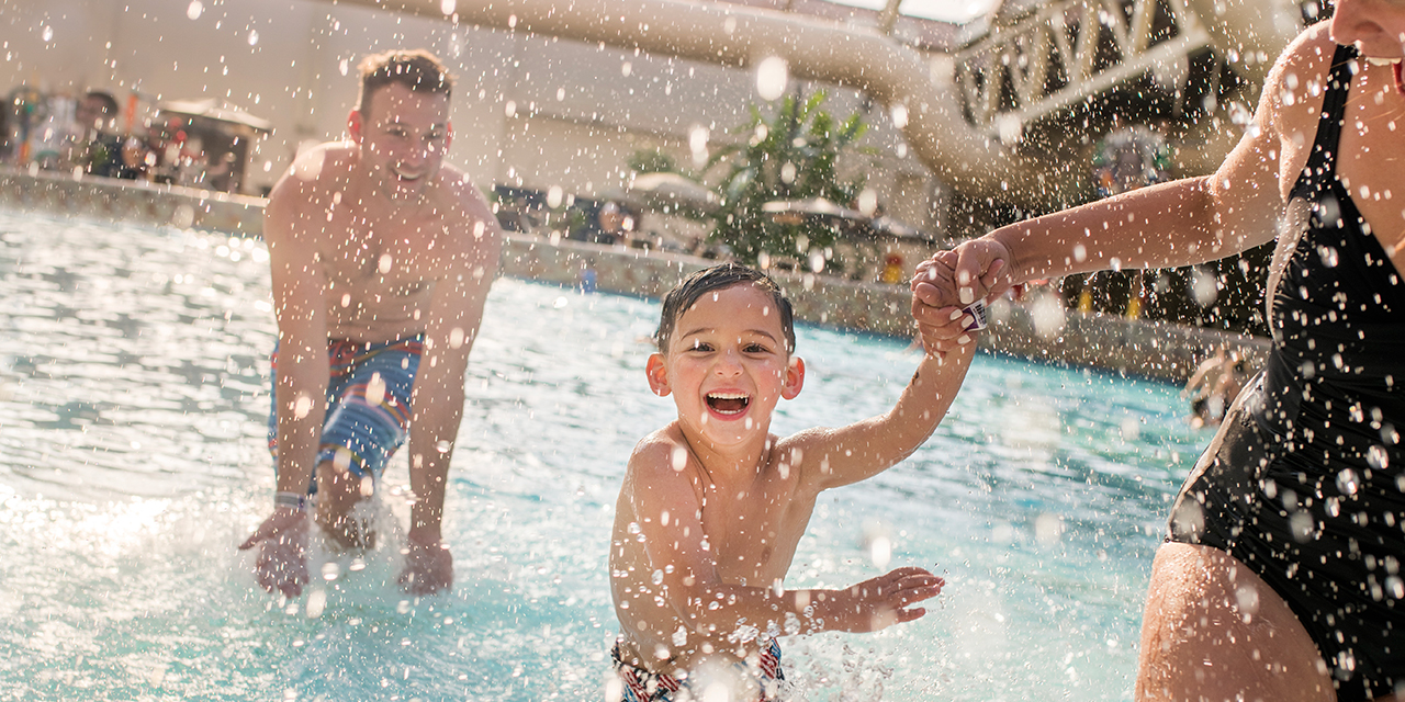 Family at Wilderness Dome wave pool.