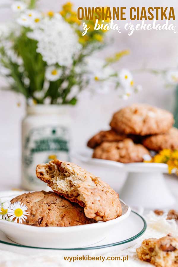 a plate of cookies and flowers