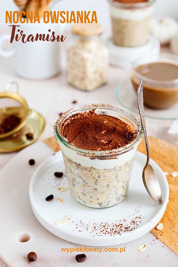 a glass jar with oatmeal and a spoon on a plate